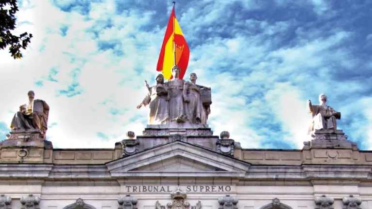 Spanish Supreme Court building in Madrid with national flag